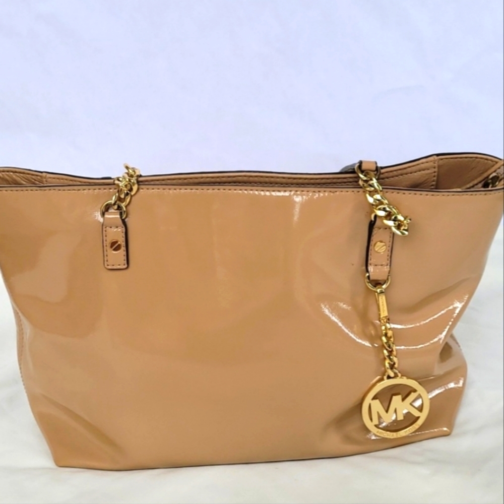 Brand Michael Kors purse.
